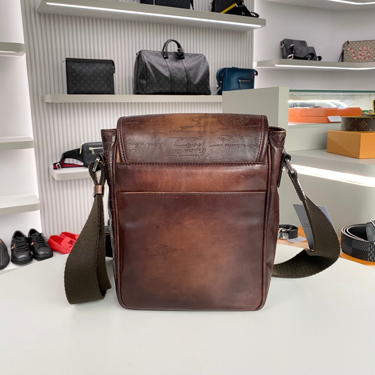 BERLUTI JOUR J SCRITTO ENGRAVED SLINGBAG