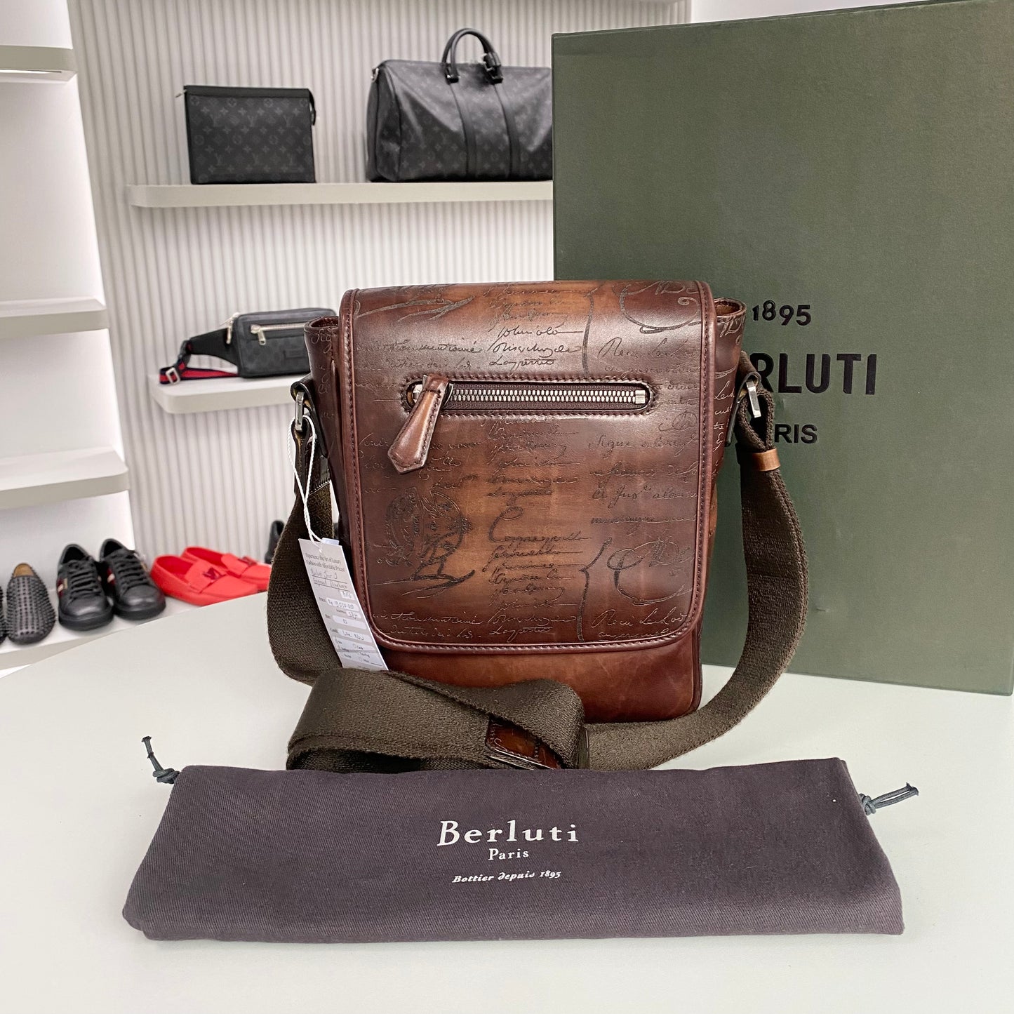 BERLUTI JOUR J SCRITTO ENGRAVED SLINGBAG